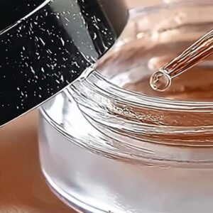 Luxurious rose gold gel nail polish being mixed in a clear glass bowl, perfect for nail art and manicure services. Stunning, high-quality nail products at Golden Rose Nail Studio.